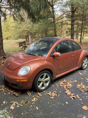 Orange 2010 Volkswagen New Beetle Red Rock Edition