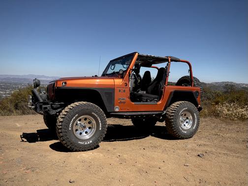 Orange 2002 Jeep Wrangler X