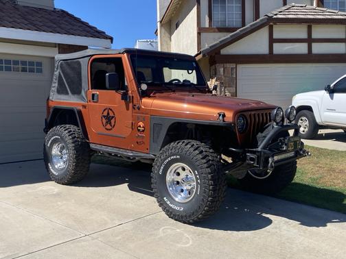 Orange 2002 Jeep Wrangler X