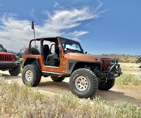 Orange 2002 Jeep Wrangler X