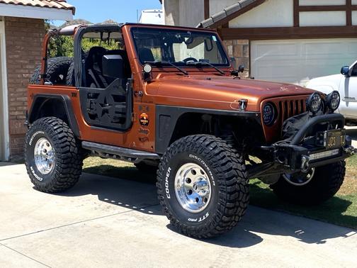 Orange 2002 Jeep Wrangler X