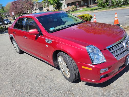 Red 2009 Cadillac STS V6
