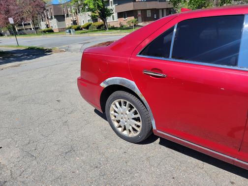 Red 2009 Cadillac STS V6