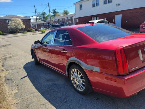 Red 2009 Cadillac STS V6