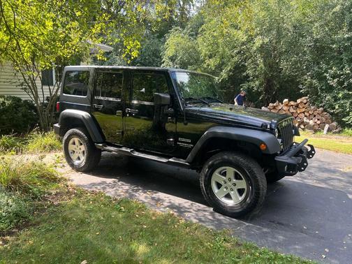 Black 2016 Jeep Wrangler Unlimited Sport