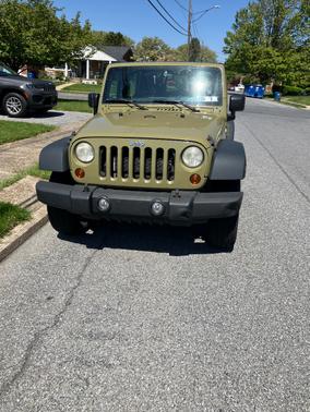 Green 2013 Jeep Wrangler Sport