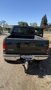 Green 2003 Ford F-250 Lariat Crew Cab Super Duty