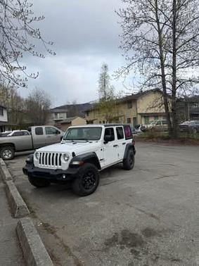 White 2023 Jeep Wrangler Sport