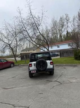 White 2023 Jeep Wrangler Sport