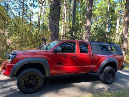 Red 2010 Toyota Tacoma Access Cab
