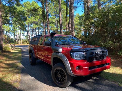 Red 2010 Toyota Tacoma Access Cab