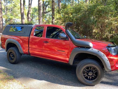 Red 2010 Toyota Tacoma Access Cab
