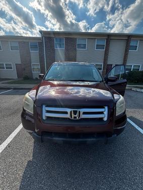 Red 2008 Honda Pilot EX-L