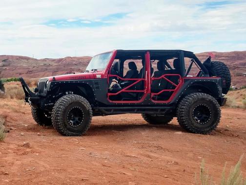 Red 2012 Jeep Wrangler Unlimited Sport
