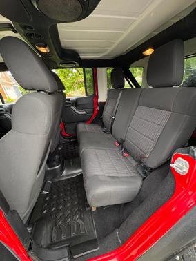 Red 2012 Jeep Wrangler Unlimited Sport