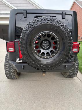 Red 2012 Jeep Wrangler Unlimited Sport