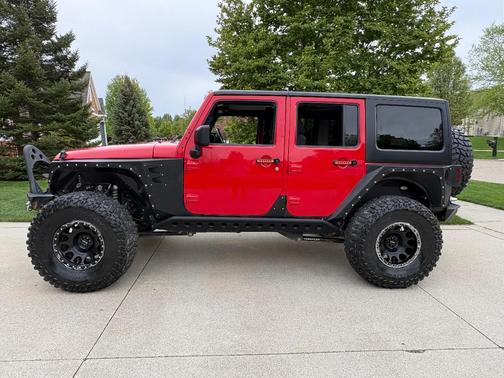 Red 2012 Jeep Wrangler Unlimited Sport