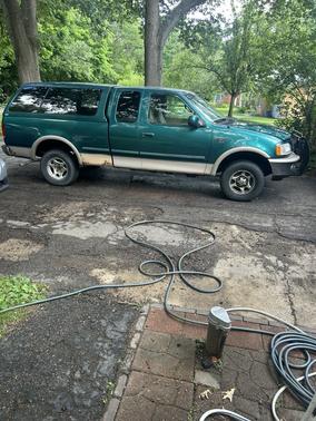 Green 1998 Ford F-150 XLT SuperCab