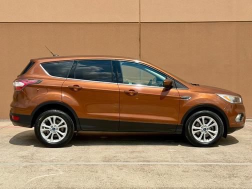 Orange 2017 Ford Escape SE