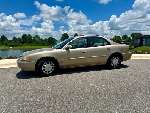 Gold 2005 Buick Century Base