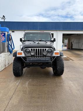 Beige 2000 Jeep Wrangler Sport