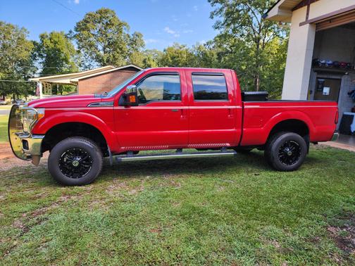 Red 2015 Ford F-250 Lariat