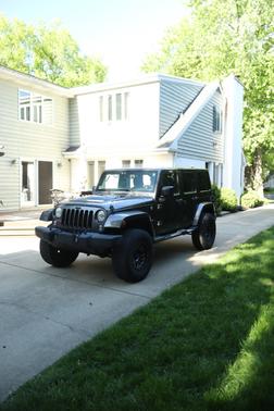 Gray 2017 Jeep Wrangler Unlimited Sahara
