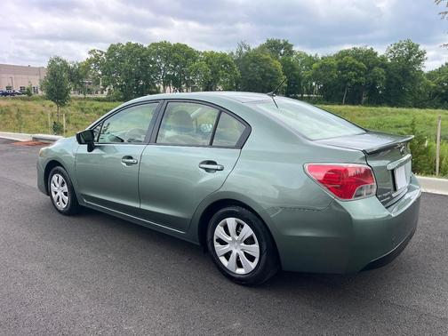Green 2015 Subaru Impreza 2.0i
