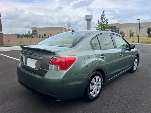 Green 2015 Subaru Impreza 2.0i