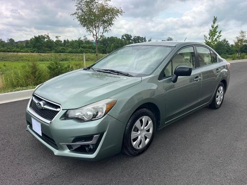 Green 2015 Subaru Impreza 2.0i