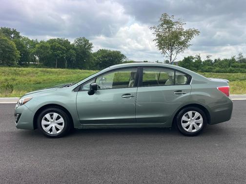 Green 2015 Subaru Impreza 2.0i