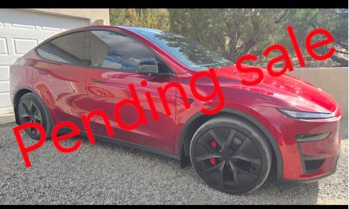 Red 2026 Tesla Model Y Performance AWD