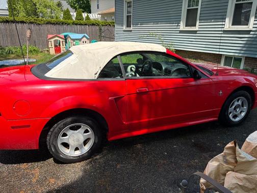 Red 2000 Ford Mustang Base