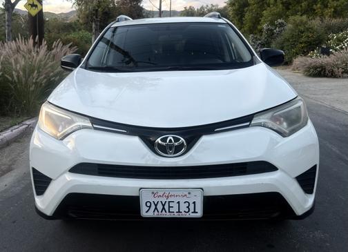 White 2016 Toyota RAV4 LE