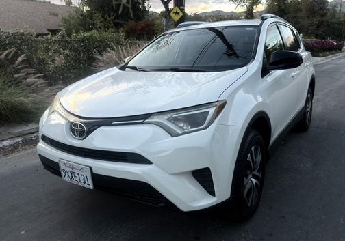 White 2016 Toyota RAV4 LE