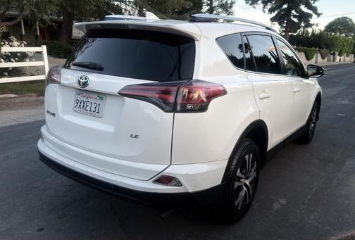 White 2016 Toyota RAV4 LE