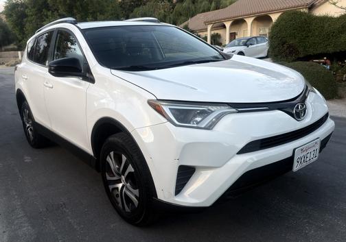 White 2016 Toyota RAV4 LE