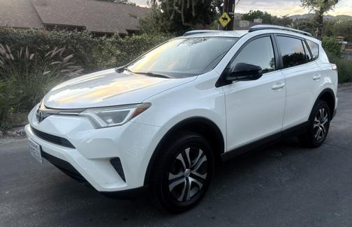 White 2016 Toyota RAV4 LE