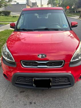 Red 2012 Kia Soul +