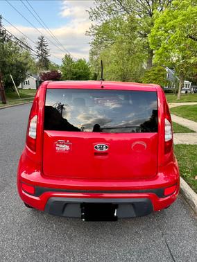 Red 2012 Kia Soul +