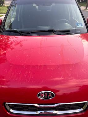 Red 2012 Kia Soul +