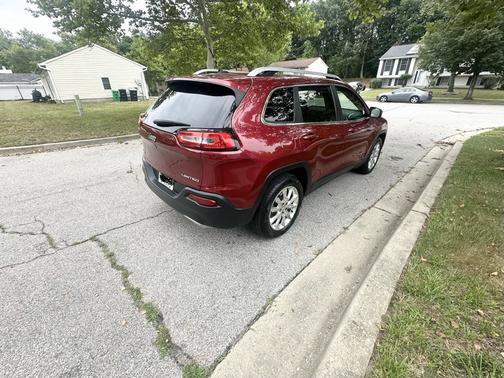 Red 2015 Jeep Cherokee Limited