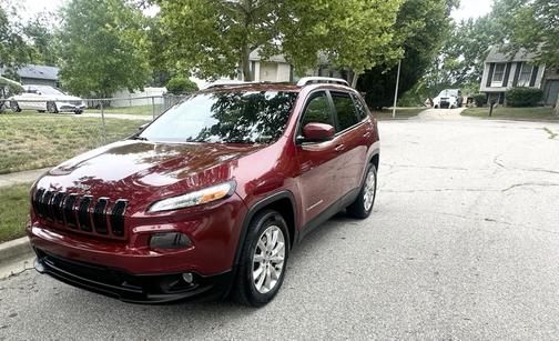 Red 2015 Jeep Cherokee Limited