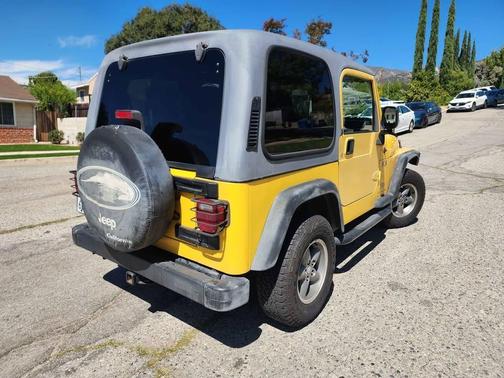 Yellow 2004 Jeep Wrangler X