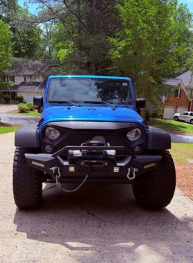 Blue 2016 Jeep Wrangler Unlimited Sport