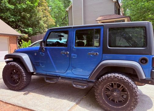 Blue 2016 Jeep Wrangler Unlimited Sport
