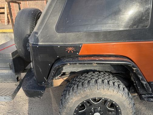 Orange 2010 Jeep Wrangler Rubicon