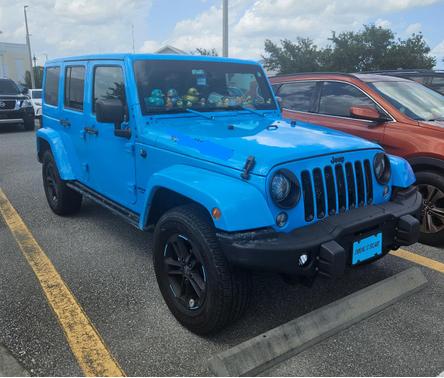 Blue 2017 Jeep Wrangler Unlimited Sahara
