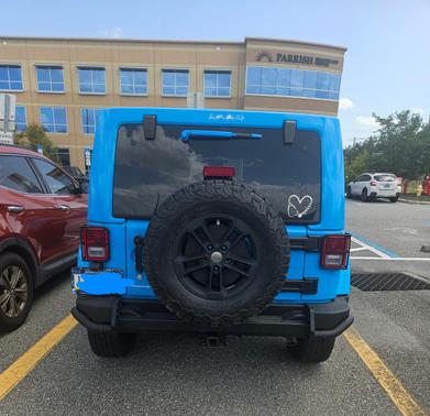Blue 2017 Jeep Wrangler Unlimited Sahara