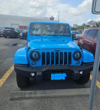 Blue 2017 Jeep Wrangler Unlimited Sahara